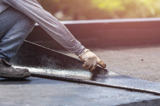 Professional Waterproofing technician working in Osseo, WI